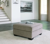 Creswell Ottoman With Storage - furniture place usa