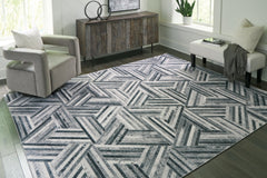 Adalock 7'10" x 10' Rug - furniture place usa
