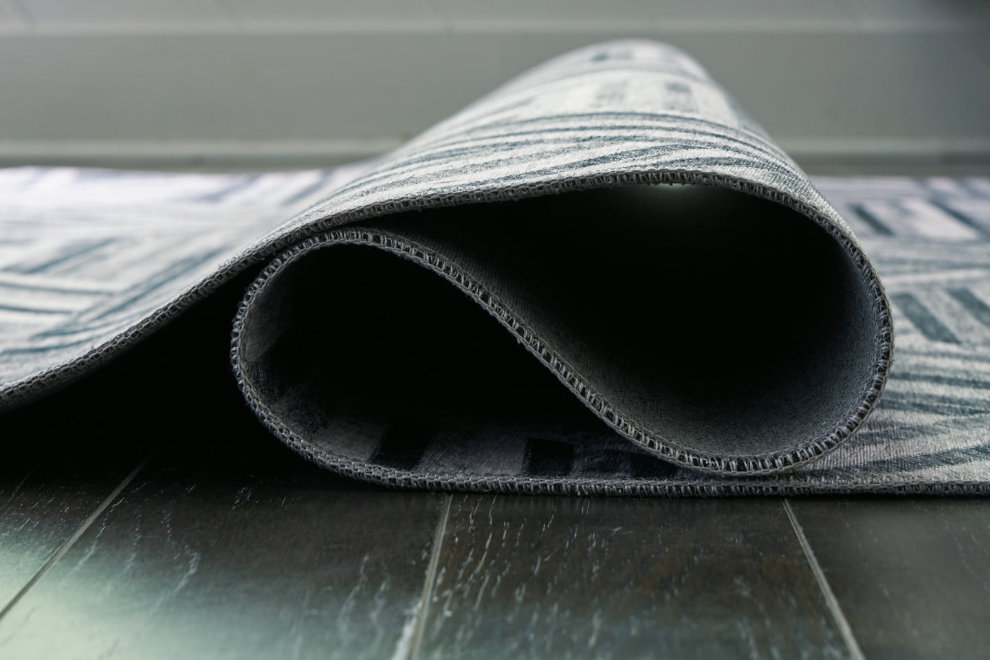 Adalock 7'10" x 10' Rug - furniture place usa