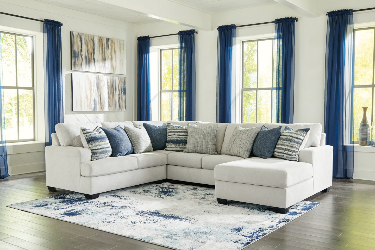 Lowder 4-Piece Sectional with Ottoman - PKG012996 - furniture place usa