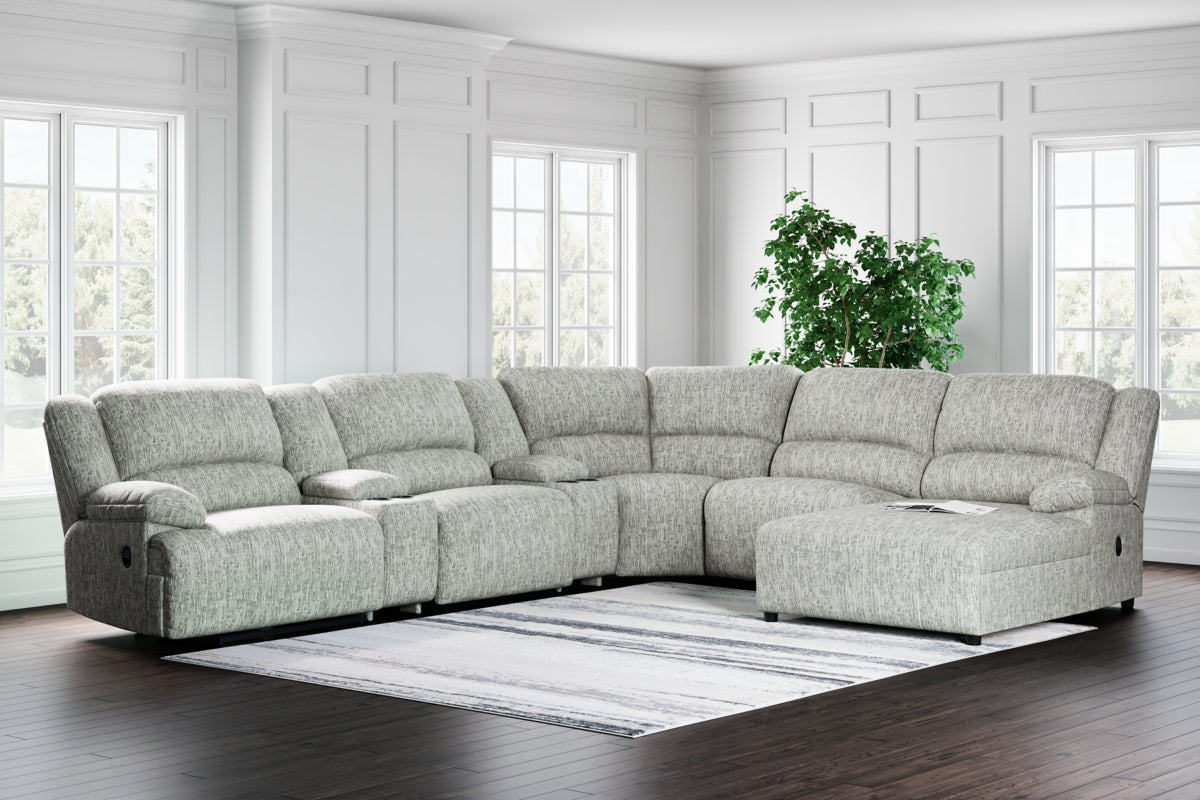 McClelland 7-Piece Reclining Sectional with Chaise - furniture place usa