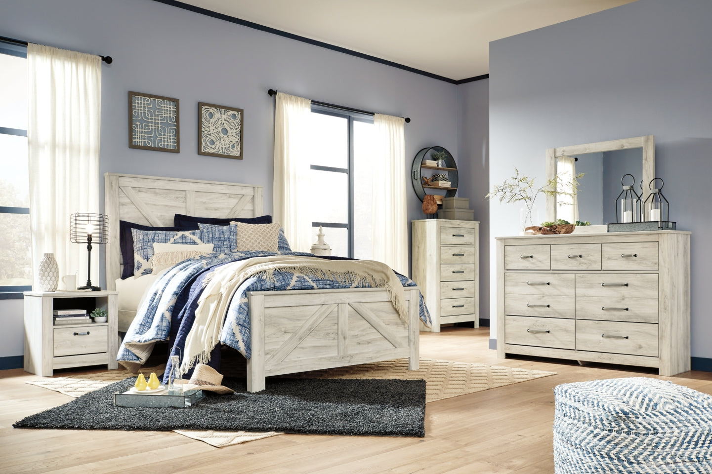 Bellaby King Crossbuck Panel Bed with Mirrored Dresser, Chest and 2 Nightstands - furniture place usa