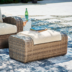 Sandy Bloom Outdoor Ottoman with Cushion - furniture place usa